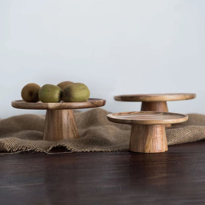 Rustic Wooden Cake Stand with a natural wood finish, featuring a sturdy widened base, perfect for displaying cakes, desserts, or snacks."