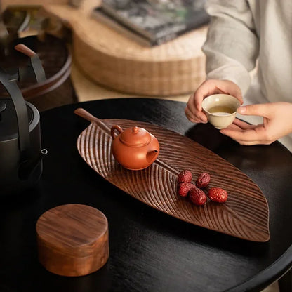 Close-up of Walnut Leaf Tea Tray's smooth polished surface – Detailed view of the tray’s polished walnut wood surface, showcasing its fine grain.