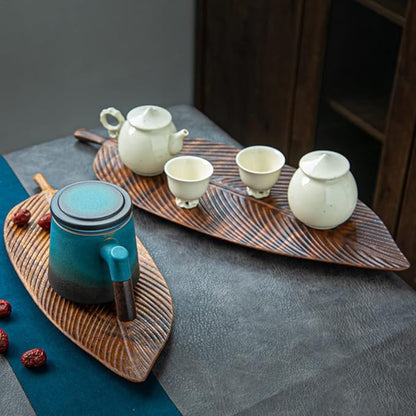 Styled Wooden Leaf Tray with decorative items – Walnut tray displayed with candles, flowers, and decor items to elevate a room’s aesthetic.