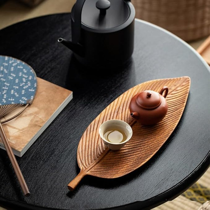 Elegant polished walnut wood surface of Walnut Leaf Tea Tray – A closer look at the polished surface, showcasing the fine details and natural beauty of the wood.