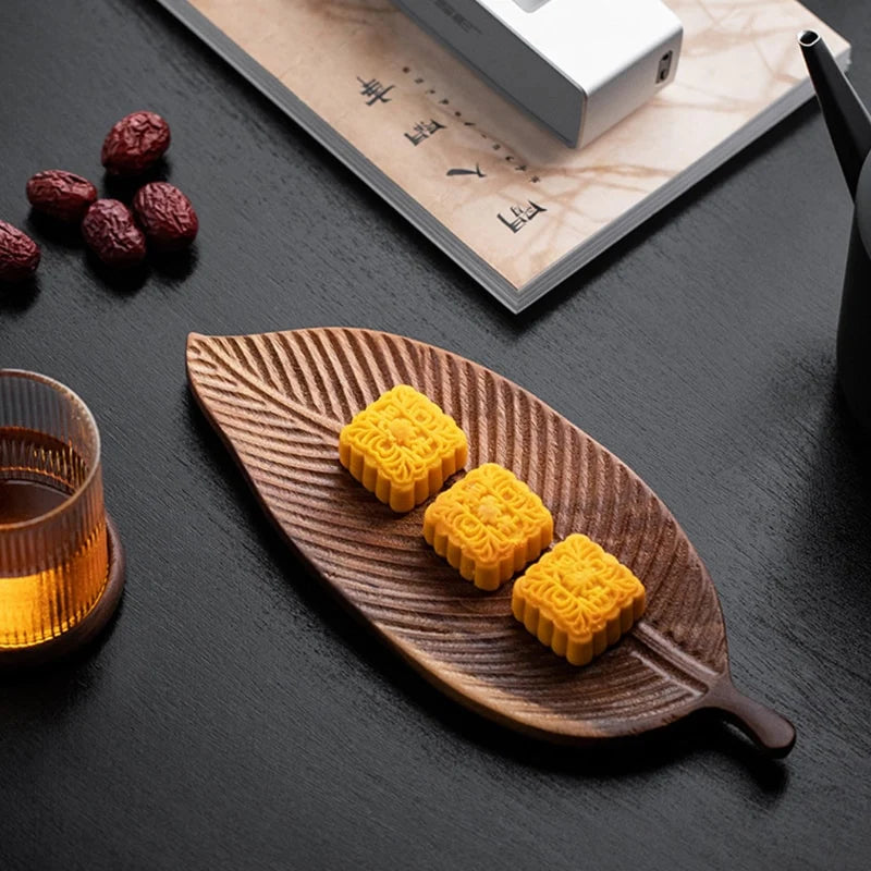 Natural wood texture of Walnut Leaf Tea Tray with intricate grain details – Close-up focusing on the intricate grain patterns, demonstrating the craftsmanship of the walnut wood.