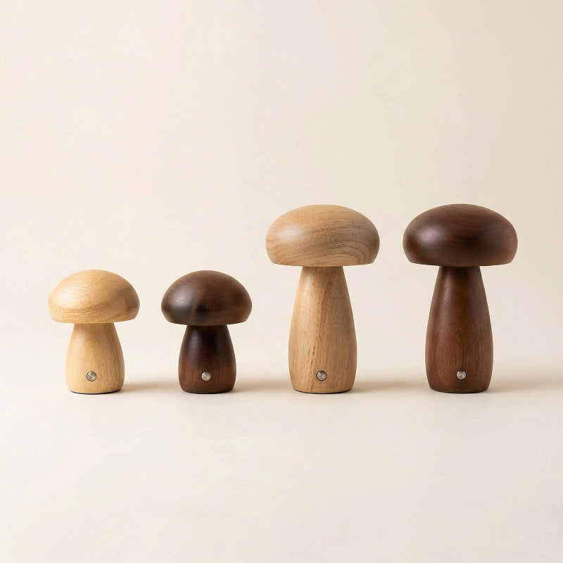 Set of four wooden mushroom-shaped objects on a beige background