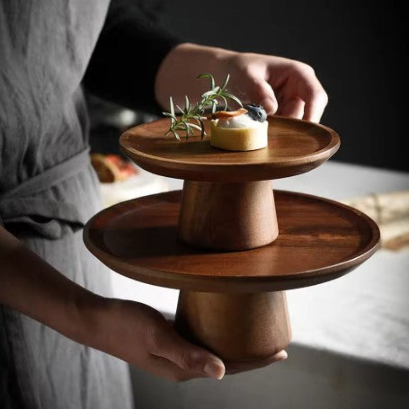 Wooden Cake Stand elegantly displaying a beautifully frosted cake, highlighting its natural wood finish and versatile design.