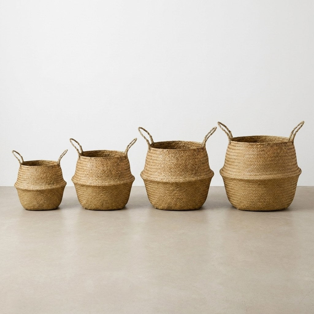 Woven seagrass baskets in all four sizes lined up, Kiyo Home