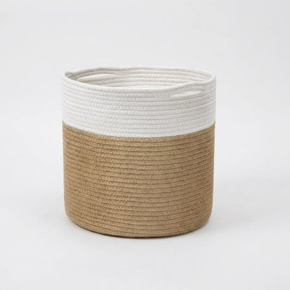 Woven Storage Basket in white and tan two-tone cotton rope with handles, shown at a slight angle on a clean off-white background