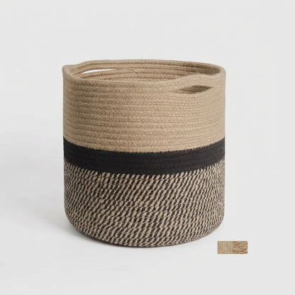 Woven Storage Basket in black and tan two-tone cotton rope with handles, front view on a clean off-white background