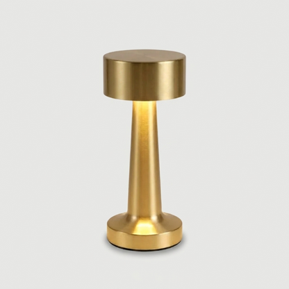 Zain cordless rechargeable table lamp in gold on white background
