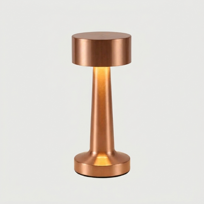 Zain cordless rechargeable table lamp in rose gold on white background