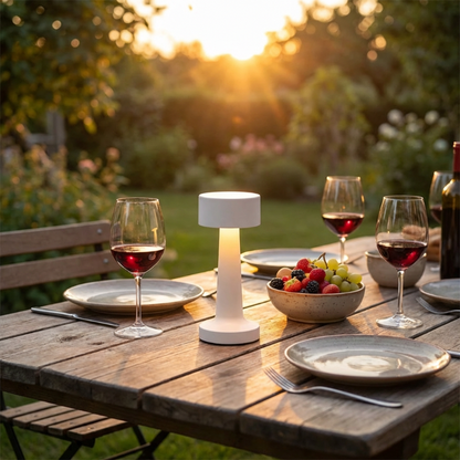 Zain cordless rechargeable table lamp in white on rooftop table at sunset